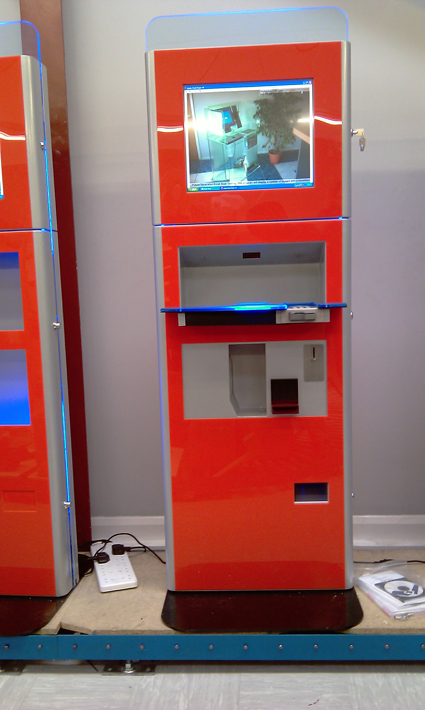 This kiosk, comes with interactive 19'' display. At the rear of the unit a large passive of interactive second screen could replace the static advertisment area.